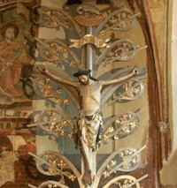 The place with Gothic Tree of Life by the mural depicting a legend associated with Mary Magdalene in Toruń St. James's church was previously occupied by the Lizard Society’s altar
