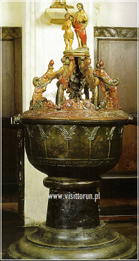 Early-Gothic (turn of the 13th century) baptismal font in the Chapel of Nicolaus Copernicus