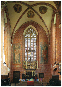 Presbitery is richly decorated with Gothic ornamentation, among other two paintings of the patrons